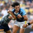 Seen here, Tino Fa'asuamaleaui playing in the NRL with the Gold Coast Titans.