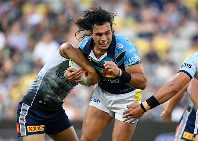 Seen here, Tino Fa'asuamaleaui playing in the NRL with the Gold Coast Titans.