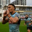 Sharks too slick for Cowboys in the wet