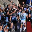Sharks rout Titans but lose McInnes to knee injury