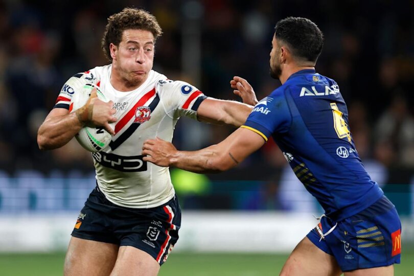 Mark Nawaqanitawase is tackled.