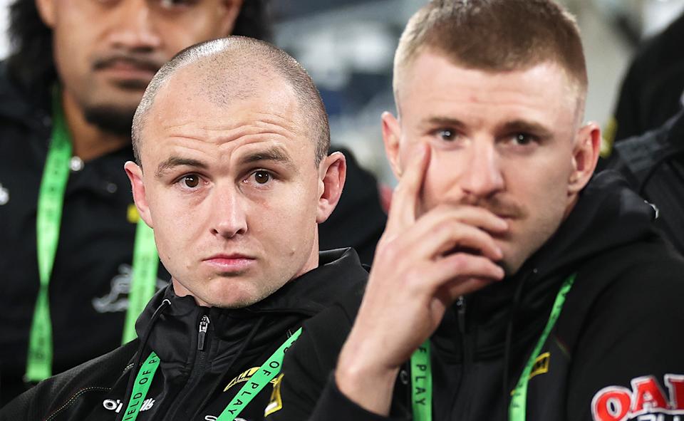 Dylan Edwards and Luke Garner, pictured here watching the Panthers and Bulldogs game from the stands.