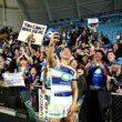 Roger Tuivasa-Sheck celebrates with fans on the Gold Coast.