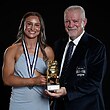 Andie Robinson received the inaugural Bulldogs NRLW Player of the Year award from club great Dr George Peponis.