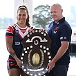 Roosters captain Isabelle Kelly and coach John Strange with the Nellie Doherty Shield for winning the 2025 NRLW minor premiership.