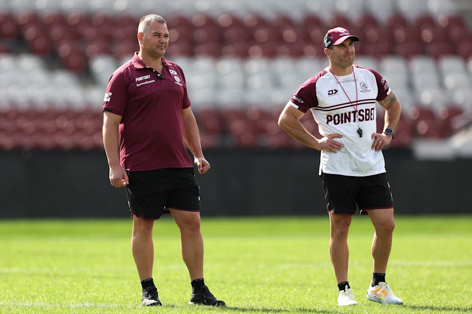 Pictured right to left, Manly assistant Michael Ennis and coach Anthony Seibold.