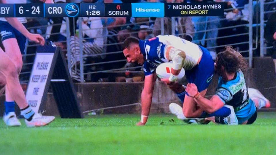 Hynes is facing a fine for this tackle on Marcelo Montoya. Picture: Fox League