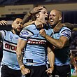 Pictured middle, Cronulla Sharks star Nicho Hynes.