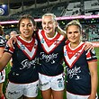 Brydie Parker celebrates her NRLW debut in 2018 with Sarah Togatuki and Nita Maynard-Perrin.