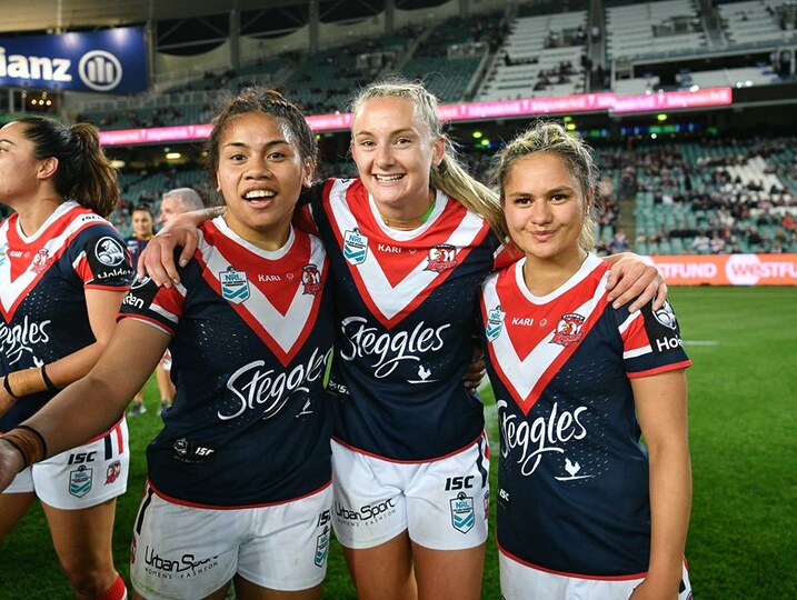 Brydie Parker celebrates her NRLW debut in 2018 with Sarah Togatuki and Nita Maynard-Perrin.