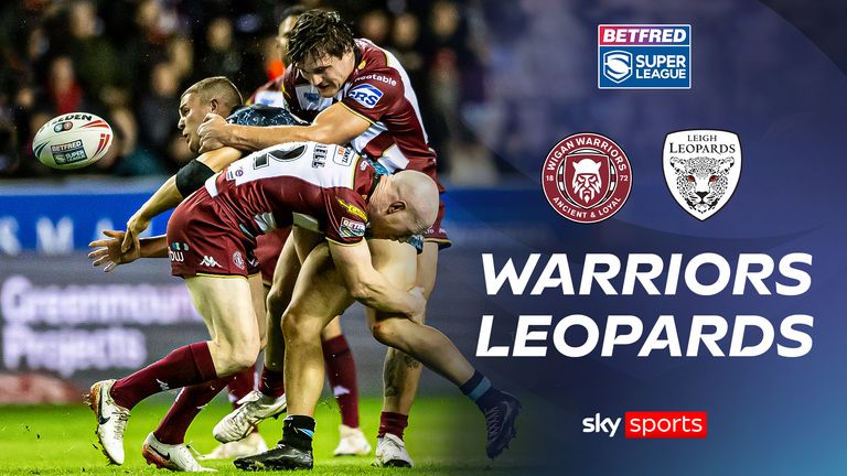 Leigh's Bailey Hodgson has the ball forced free by Wigan's Liam Byrne and Liam Marshall