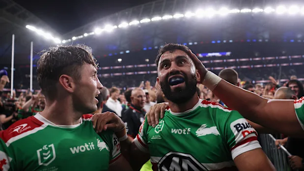 Alex Johnston is swamped by fans at Allianz Stadium.