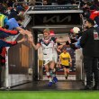 Connor Watson runs out with the Roosters during the Beanies for Brain Cancer round against the Broncos.