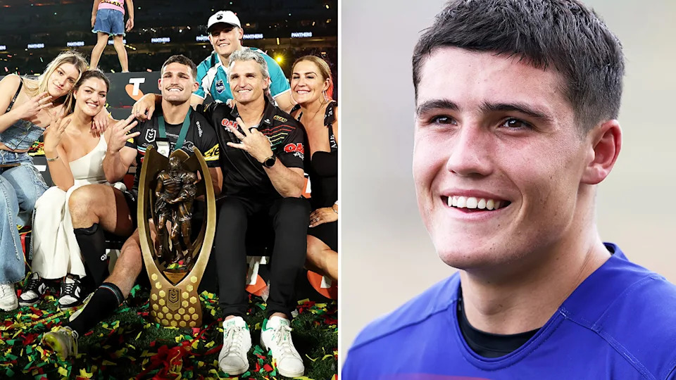 Nathan Cleary and his family pose with they trophy and Jett Cleary during a game.