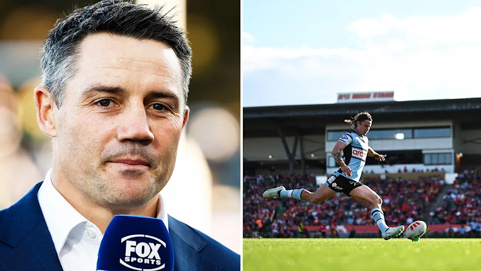 Cooper Cronk during broadcast and Nicho Hynes kicks the ball.