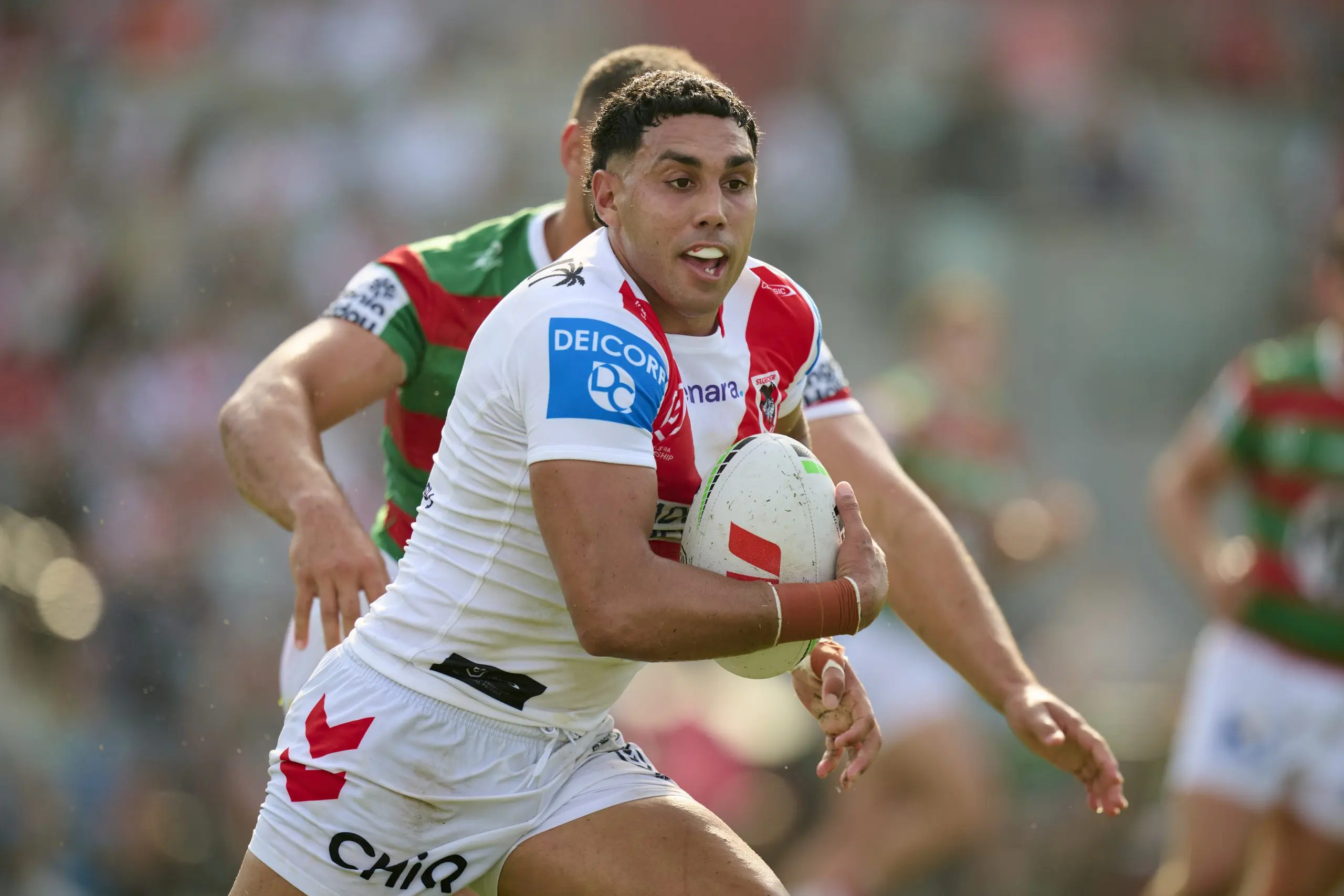 WOLLONGONG, AUSTRALIA - MARCH 15: Tyrell Sloan of the Dragons runs the ball during the round two NRL match between St George Illawarra Dragons and South Sydney Rabbitohs at WIN Stadium, on March 15, 2025, in Wollongong, Australia. (Photo by Brett Hemmings/Getty Images)