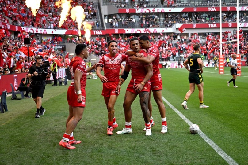 Haumole Olakau'atu celebrates after scoring a try against the Kangaroos in 2024