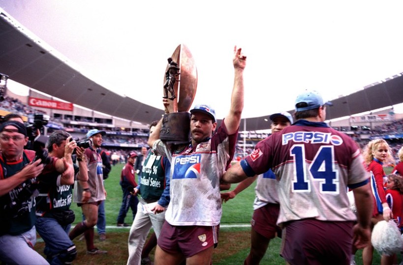 Cliff Lyons lifts the Provan-Summons Trophy in 1996