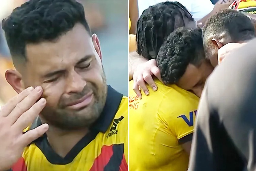 Rhyse Martin with PNG teammates at the Rugby League World Cup.