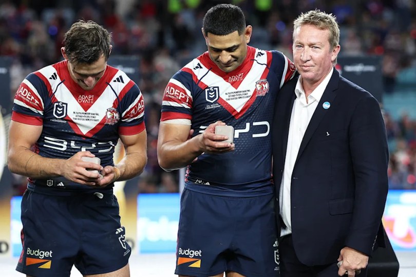Trent Robinson with Roosters players after the NRL grand final.